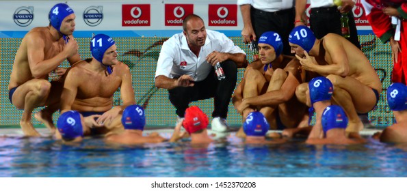 Budapest, Hungary - Jul 14, 2014. BENEDEK Tibor head coach and the hungarian men waterpolo team in the break. LEN Waterpolo European Championship was held in Alfred Hajos Swimming Centre in 2014.