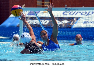 Budapest, Hungary - Jul 16, 2014. WILCOX Chloe (GBR, 2) and PLEVRITOU Eleftheria  (GRE, 11). The Waterpolo European Championship was held in Alfred Hajos Swimming Centre in 2014.