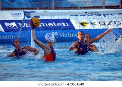 Budapest, Hungary - Jul 16, 2014. Hungary's Rita Keszthelyi (HUN, 8) defending against MEGENS Maud (NED, 9). The Waterpolo European Championship was held in Alfred Hajos Swimming Centre in 2014.