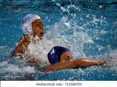 Budapest, Hungary - Jul 16, 2017. GURISATTI Greta (HUN) fights with INABA Akari (JPN) in the preliminary round. FINA Waterpolo World Championship was held in Alfred Hajos Swimming Centre in 2017.