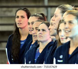 Budapest, Hungary - Jul 16, 2017. Hungarian women waterpolo team listen the national anthem, BUJKA Barbara in focus. FINA Waterpolo World Championship was held in Alfred Hajos Swimming Centre in 2017.