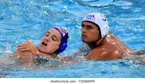 Budapest, Hungary - Jul 17, 2017. HALLOCK Ben (USA) fights with MACAN Marko (CRO) in the preliminary round. FINA Waterpolo World Championship was held in Alfred Hajos Swimming Centre in 2017.