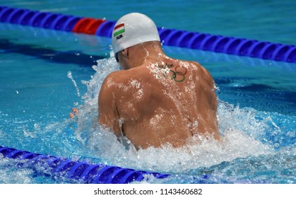 Budapest, Hungary - Jul 25, 2017. Competitive swimmer FINANCSEK Gabor (HUN) swimming breastroke. FINA Swimming World Championship Preliminary Heats in Duna Arena.