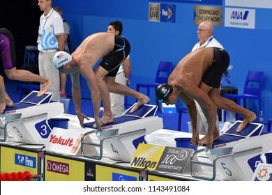 Budapest, Hungary - Jul 25, 2017. Competitive swimmer MARTINENGHI Nicolo (ITA) and CORDES Kevin (USA) swimming breastroke. FINA Swimming World Championship Preliminary Heats.