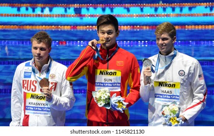 Budapest, Hungary - Jul 25, 2017. HAAS Townley (USA, )SUN Yang (CHN) and KRASNYKH Aleksandr (RUS) at the Victory Ceremony of the Men's 200m Freestyle. FINA Swimming World Championship.