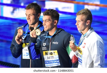 Budapest, Hungary - Jul 26, 2017. WOJDAK Wojciech (POL), PALTRINIERI Gregorio (ITA) and winner DETTI Gabriele (ITA) at Victory Ceremony of the Men's 800m freestyle. FINA Swimming World Championship.