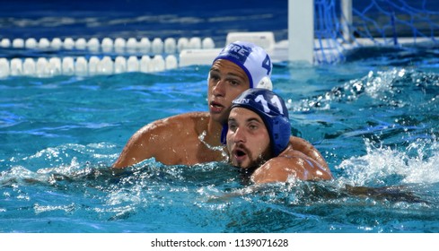 Budapest, Hungary - Jul 27, 2017. MEZEI Tamas (HUN, cap 11) fights against DERVISIS Georgios (GRE, cap 4). FINA Waterpolo World Championship, Semifinal.