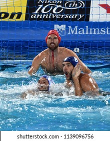 Budapest, Hungary - Jul 27, 2017. GOR-NAGY Miklos (8) and NAGY Viktor (1) defend against Greece Waterpolo Team. FINA Waterpolo World Championship, Semifinal.