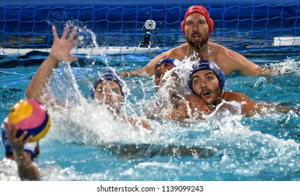 Budapest, Hungary - Jul 27, 2017. GOR-NAGY Miklos (8) and NAGY Viktor (1) defend against Greece Waterpolo Team. FINA Waterpolo World Championship, Semifinal.