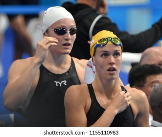 Budapest, Hungary - Jul 28, 2017. Competitive swimmer BARRATT Holly (AUS) and WORRELL Kelsi (USA) after swimming 50m Butterfly. FINA Swimming World Championship Preliminary Heats in Duna Arena.