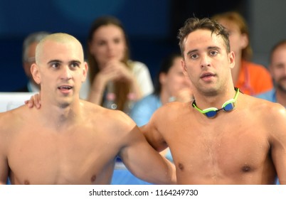 Budapest, Hungary - Jul 28, 2017. Competitive swimmer CSEH Laszlo (HUN) and LE CLOS Chad (RSA) after the 100m Butterfly SemiFinal. FINA Swimming World Championship was held in Duna Arena.