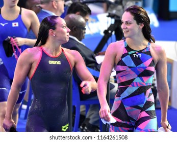 Budapest, Hungary - Jul 28, 2017. Competitive swimmer DI PIETRO Silvia (ITA) and GASTALDELLO Beryl (FRA) after the 50m Butterfly SemiFinal. FINA Swimming World Championship was held in Duna Arena.