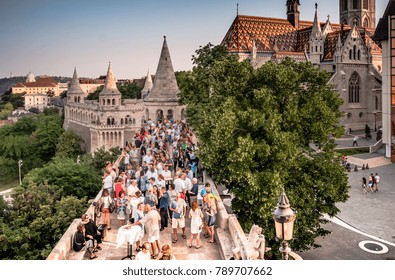 Budapest, Hungary - July 07, 2015: People On Terrace And Mathias Church In Fishermen Bastion Top View