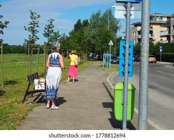 Budapest, Hungary - July 09, 2020: Two Women Waiting For The Bus In Budapest Suburb Green Area, Hungary