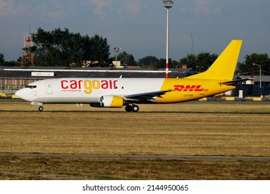 Budapest, Hungary - July 21, 2016: Cargoair DHL cargo plane at airport. Air freight and shipping. Aviation and aircraft. Transport industry. Global international transportation. Fly and flying.