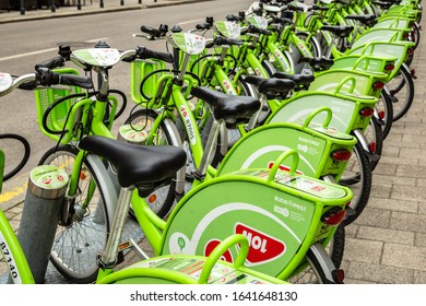 Budapest, Hungary - March 25, 2018: Public Green Bicycles To Rent In The Center Of The Hungarian City. Bike-sharing. Ecological Means Of Transport. Measure In The Towns Against Air Pollution. Bikes