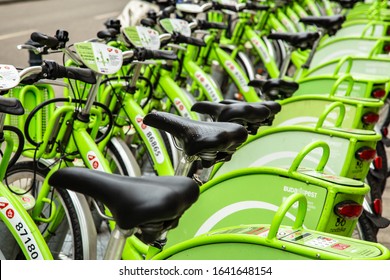 Budapest, Hungary - March 25, 2018: Public Green Bicycles To Rent In The Center Of The Hungarian City. Bike-sharing. Ecological Means Of Transport. Measure In The Towns Against Air Pollution. Bikes