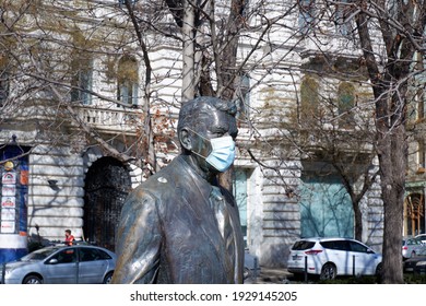 Budapest, Hungary - March 4, 2021: Life Size Ronald Reagan Statue In Face Mask Due To Coronavirus Pandemic Near To Kossuth Square