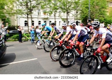 Budapest, Hungary: May 06, 2022. Cyclists At The Start Of Giro D'`Italia 105 Bicycle Road Race. Starting At The Heros` Square. Slow Pace At The Front Line. Blurred Background. Cycling Race Closeup.