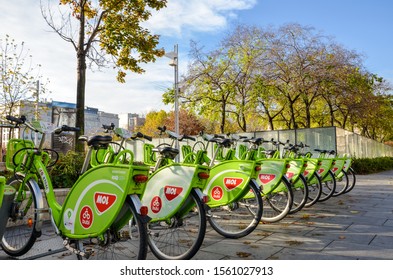 Budapest, Hungary - Nov 6, 2019: Public Green Bicycles To Rent In The Center Of The Hungarian City. Bike-sharing. Ecological Means Of Transport. Measure In The Towns Against Air Pollution. Bikes.