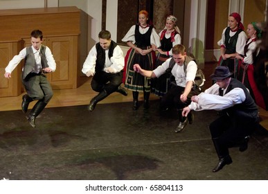 BUDAPEST, HUNGARY - NOVEMBER 19: ELTE University Hungarian Folk Dance Group On The Stage Of ELTE University On November 19, 2010 In Budapest, Hungary.