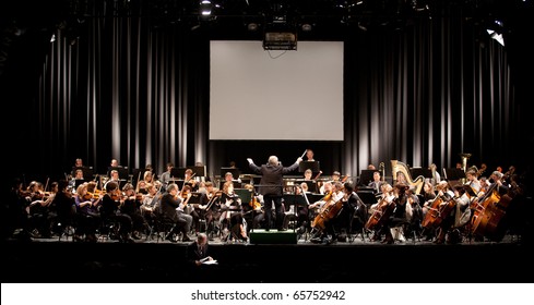 BUDAPEST, HUNGARY - NOVEMBER 20: The MAV Symphonic Orchestra Performs At The Millenaris Stage On Nov 20, 2010 In Budapest, Hungary. Conductor: Antal Matyas