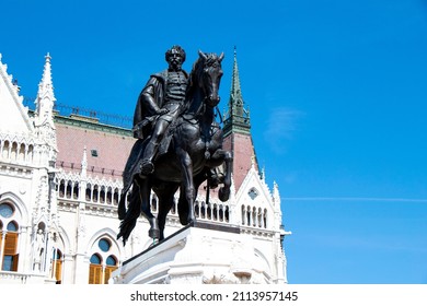 BUDAPEST, HUNGARY - September 05, 2021: Statue of Count Gyula Andrassy in front of the Hungarian Parliament Building in Budapest, Hungary