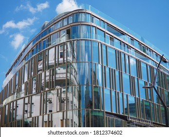 Budapest, Hungary - September 07, 2020: New Blue Colour Modern Building Construction From Glass And Metal With Reflection Of An Old Building On The Szervita Square In Budapest Downtown