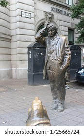 Budapest / Hungary - September 3 2018: Statue Of Lieutenant Columbo (actor Peter Falk) And His Dog - Located On Miksa Falk Street