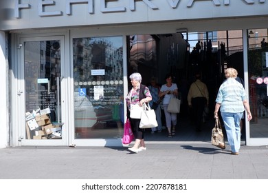 Budapest, Hungary - September 8, 2022: People Going To The Food Market 