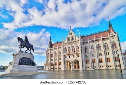 Budapest, Hungary. Statue of Count Gyula Andrassy on the Parliament Square in front of Beautiful building of Hungarian Parliament in Budapest, popular Europe travel destination.