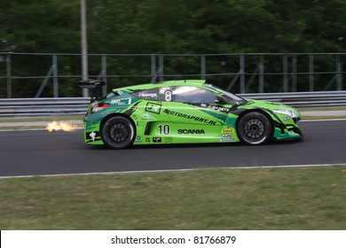 BUDAPEST - JULY 3: Renault Megane Race Car Blowing Fire On The Hungaroring Race Track At World Series By Renault On July 3, 2011 In Budapest, Hungary