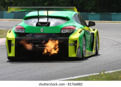 BUDAPEST - JULY 3: Renault Megane Race Car Blowing Fire On The Hungaroring Race Track At World Series By Renault,on July 3, 2011 In Budapest, Hungary