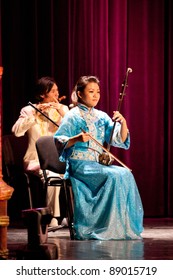 BUDAPEST - NOVEMBER 13: Members Of The Nanjing Chinese Traditional Orchestra Perform On Concert At 