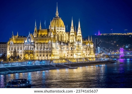 Budapest Parliament and the Danube panorama with night lighting