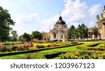 Budapest Szechenyi bath garden and castle palace colorful flowers and green grass