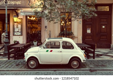 Budapest/Hungary - 10.03.2018, An Old Car In Front Of An Italian Restaurant