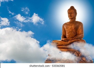 Buddha And Blue Sky Background