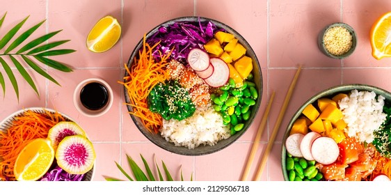 Buddha Bowl. Rice with salmon, radish, red cabbage, edamame beans and sesame seeds. The concept of delicious and healthy food. Banner