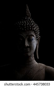 Buddha face with light and shadow