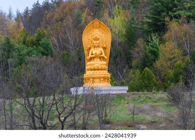 Buddha Goddess Golden plated Statue  at Wutai Shan Buddhist Garden Bethany Ontario Canada