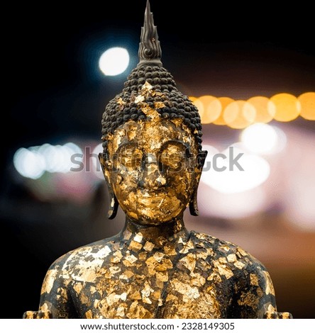 Buddha golden you from nature stone ancient ancient times clipping part Powerful, gilded bronze Buddha image.