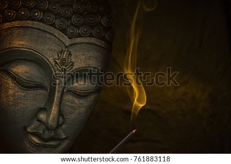 Buddha image with incense 