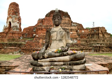 Buddha image in Wat Mahathat or The temple of the Great Relic in Ayutthaya Historical Park, Archaeological site in Ayutthaya, Thailand