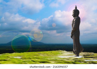 Buddha looking seven day style and sun back status mountain hill background, Makha Bucha Day is held full moon day on february or march
