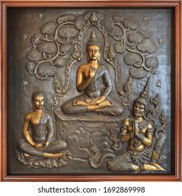 buddha metal copper carving.Mural paintings tell the story about the Buddha's history Buddha sculpture image. Asalha Puja Day. Buddhist All Saints' Day. Golden Buddha statue