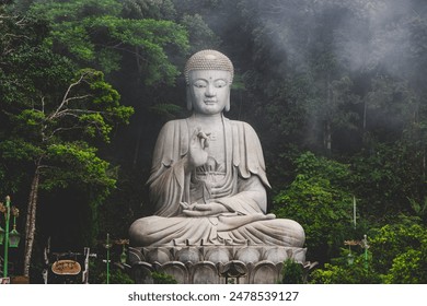 Buddha sculpture adorned with lotus flowers, representing purity and enlightenment in Buddhist tradition - Powered by Shutterstock