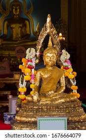 a Buddha statue in Asian country. Buddha images in Thailand are popular with gold leaf. - Shutterstock ID 1676664079