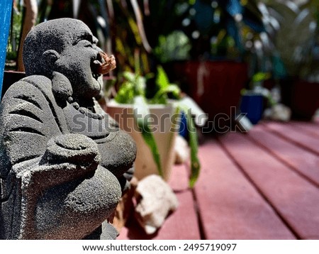 Buddha statue with Cicada shell on his nose.