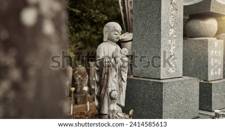 Buddha, statue and tombstone in graveyard with culture for safety, protection and sculpture outdoor in nature. Jizo, Japan and memorial gravestone with history, tradition and monument for sightseeing